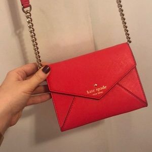 Kate Spade red wallet crossbody.